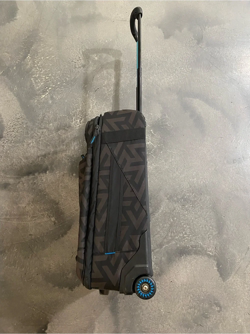 Volcom Black Carry-on Suitcase With a Geometric Grint and Electric Blue 22”x14”